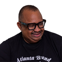 Headshot of Darryl wearing black glasses smiling for customer review section